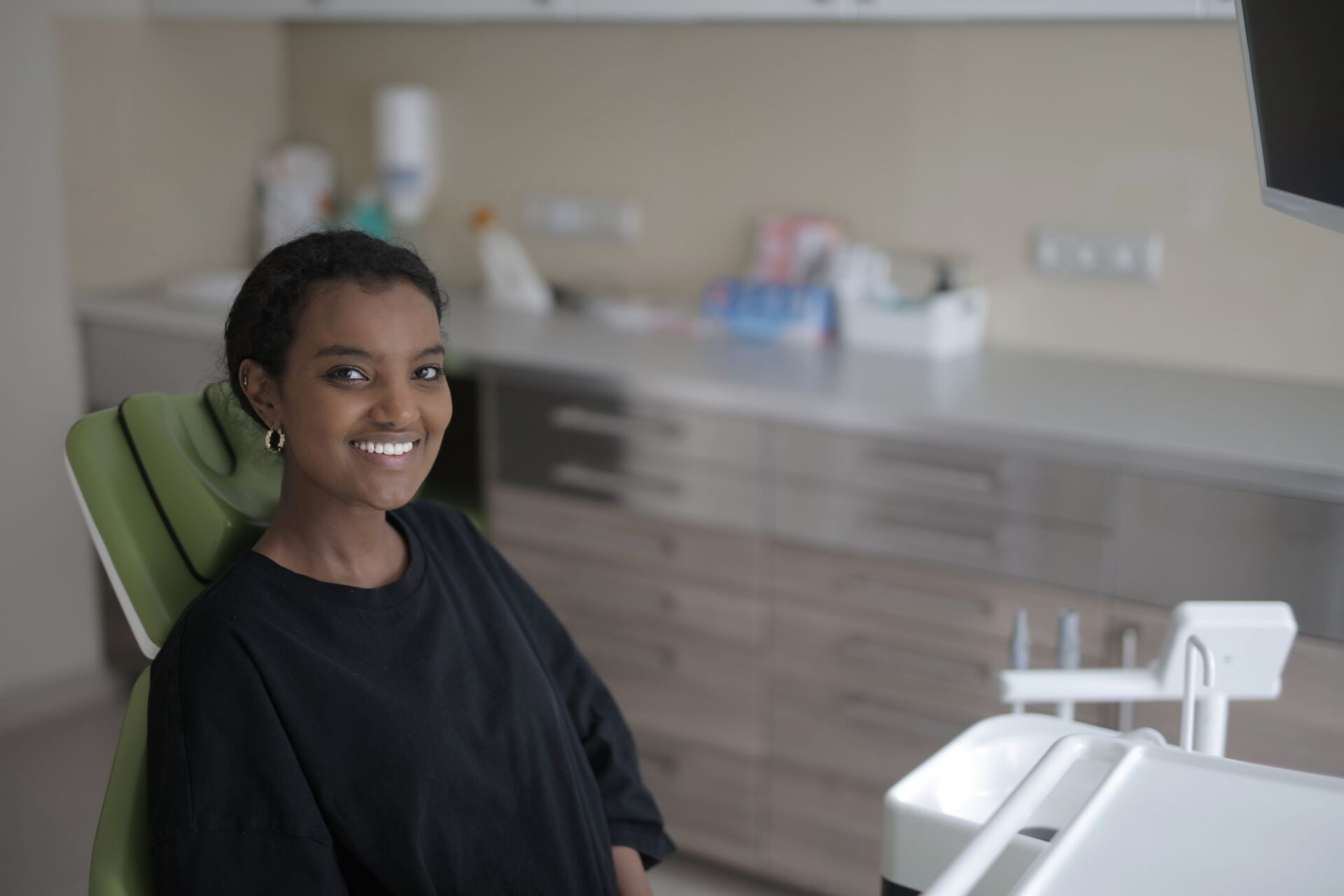 Smiling patient in dental chair